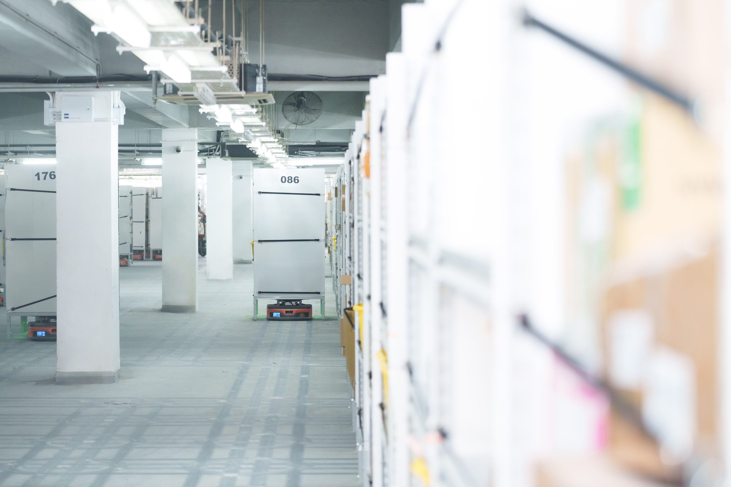 Rows of automated storage racks in the fulfilment warehouse